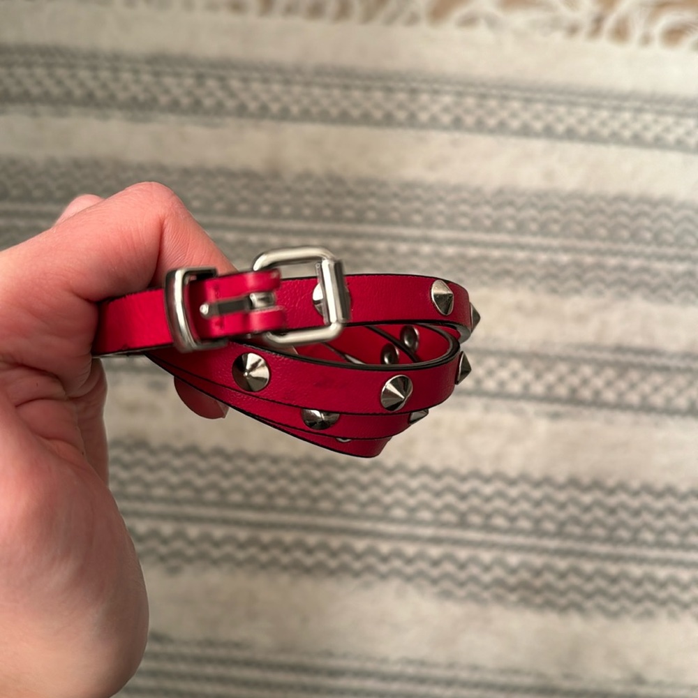 Red metal belt